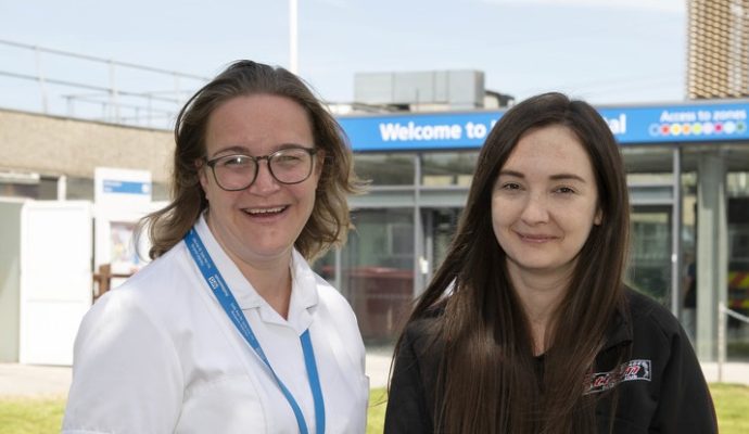 Lauren Cooper alongside physiotherapist Kat, outside Lister Hospital in Stevenage, Hertfordshire.