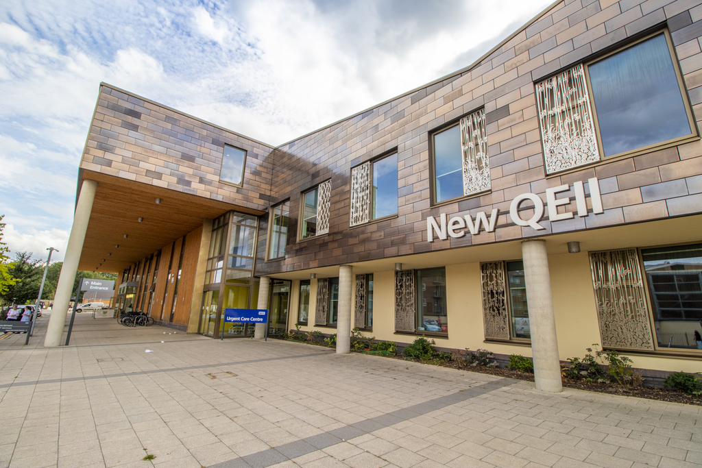 An image taken outside of the entrance to the New QEII Hospital in Welwyn Garden City. The entrance to the Urgent Treatment Centre is visible.