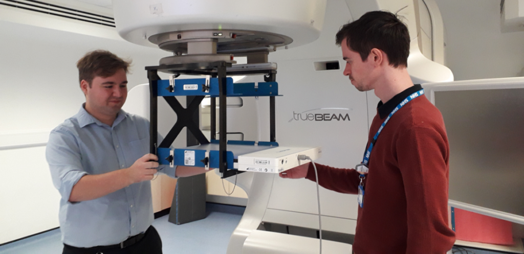 A picture of two Radiotherapy Physicists