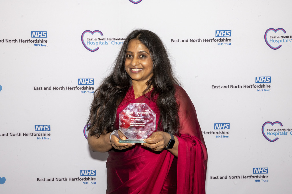 Prabin Baby with her Thriving People award.